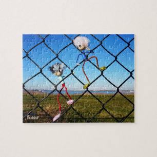 Fubby's climbing a fence. jigsaw puzzle
