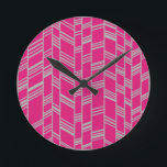 Fuchsia Art Deco Lines  Round Clock<br><div class="desc">This clock has an art deco design of grey vertical lines with grey diagonal lines connecting them on a field of fuchsia.</div>