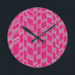 Fuchsia Art Deco Lines  Round Clock<br><div class="desc">This clock has an art deco design of grey vertical lines with grey diagonal lines connecting them on a field of fuchsia.</div>