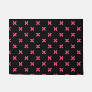 Fuchsia cross stitches on black doormat