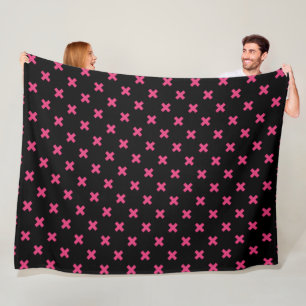 Fuchsia cross stitches on black fleece blanket