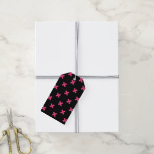 Fuchsia cross stitches on black gift tags