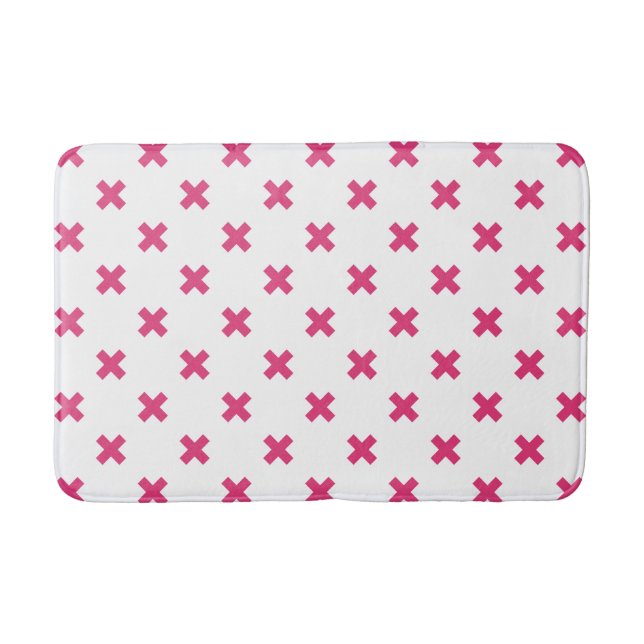Fuchsia cross stitches on white bath mat (Front)