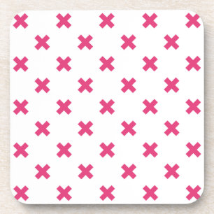 Fuchsia cross stitches on white coaster
