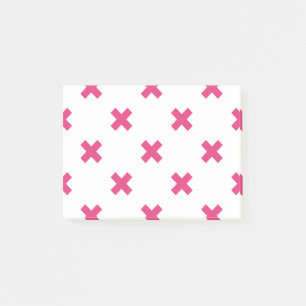 Fuchsia cross stitches on white post-it notes