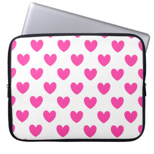 Fuchsia pink polka hearts on white laptop sleeve