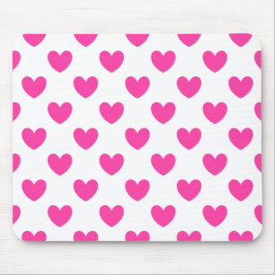 Fuchsia pink polka hearts on white mouse mat