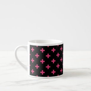 Fuchsia polka crosses on black espresso cup