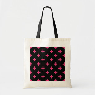 Fuchsia polka crosses on black tote bag