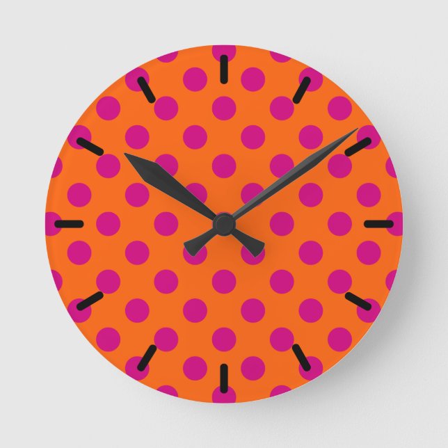 Fuchsia polka dots on orange round clock (Front)