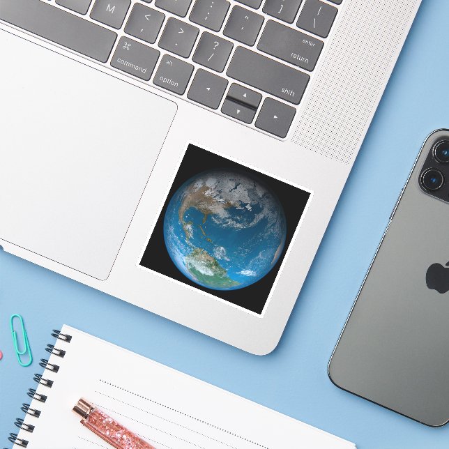 Full Earth Featuring North And South America. (Laptop w/ iPhone)