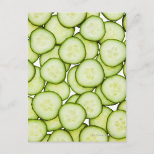 Full frame of sliced cucumber, on white postcard