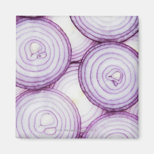 Full frame of sliced red onion, on white magnet
