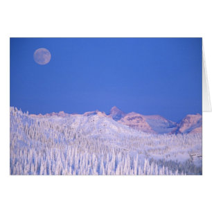 Full moon rising above Glacier National Park