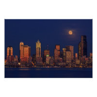 Full moon rising over downtown Seattle skyline