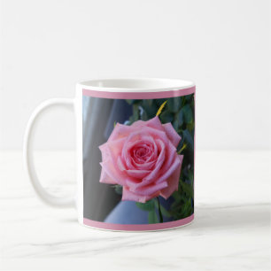 Full pink rose on a coffee mug
