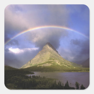 Full rainbow and stormy sky over Grinnell Square Sticker