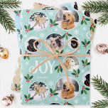 Fun Christmas Joy Snowflake Photo Collage 3 Set Wrapping Paper Sheet<br><div class="desc">'Wishing you joy' fun and stylish wrapping paper set! Three editable templates, each personalised with six photos of your family, friends or pets. You can also include a different name on each sheet. A festive pattern with snowball framed photographs, festive leaves, berries, snow, snowflakes and stars. Custom gift wrap is...</div>