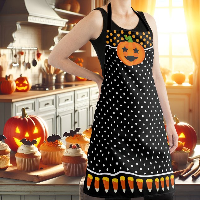 Fun Halloween Pumpkin Candy Corn Apron (Halloween pumpkin and candy corn apron, with white polka dots on black background.)