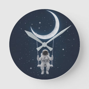 Fun in Space - Astronaut Swinging on the Moon Round Clock