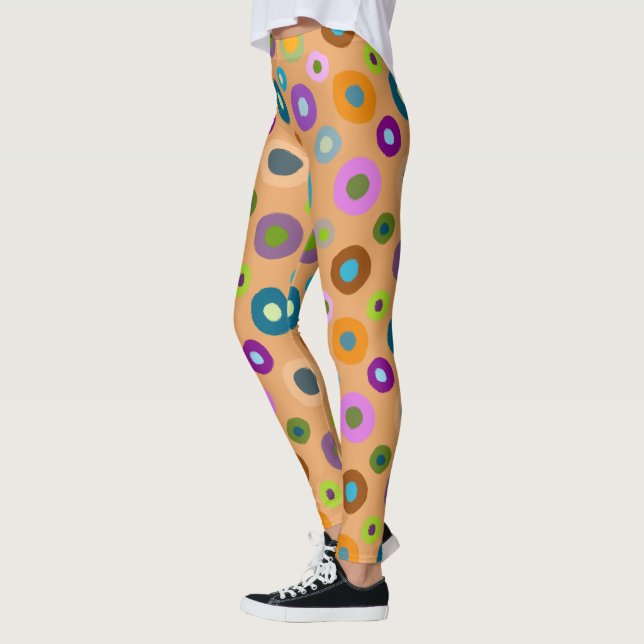 Fun leggings all over colourful dots on orange (Left)