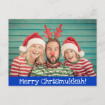 Fun Modern Merry Christmukkah Photo Blue and White Holiday Postcard<br><div class="desc">Celebrate the holiday season with this fun and merry postcard featuring your favourite family photo (or take a fun one just for Christmukkahh this year) on a blue background with white text. All the text on this card can be personalised, including the Merry Chrismukkah on the front and the Happy...</div>