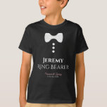 Fun Ring Bearer White Tie Wedding T-shirt<br><div class="desc">These fun t-shirts are designed as favours or gifts for wedding ring bearers. The t-shirt is black and features an image of a white bow tie and three buttons. The text reads Ring Bearer, and has a place to enter his name as well as the wedding couple's name and wedding...</div>