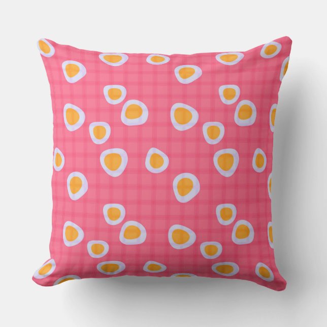 Fun spots on a coral pink chequered background cushion (Front)