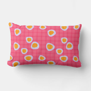 Fun spots on a coral pink chequered background lumbar cushion