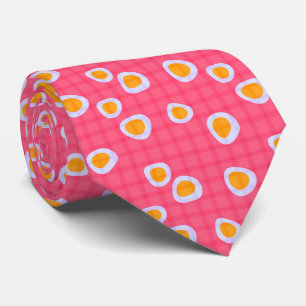 Fun spots on a coral pink chequered background tie