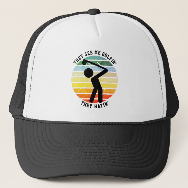 Fun THEY SEE ME GOLFIN' THEY HATIN' Retired Trucker Hat (Front)