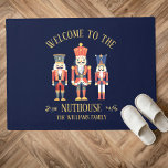 Fun Welcome to the Nuthouse Nutcracker Christmas Doormat<br><div class="desc">Welcome guests with a laugh! Our ‘Welcome to the Nuthouse’ doormat features three fun nutcrackers and your custom family name,  adding a playful vintage holiday touch to your entryway. Perfect for spreading festive cheer!</div>