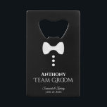 Fun White Tie Tuxedo Team Groom Wedding<br><div class="desc">This fun bottle opener is designed as a gift for Groomsmen, Family, or your Best Man. Features a fun design with a white tie and three buttons on a black background resembling a tuxedo. The text reads "Team Groom" with a place for his name, the wedding couple's names and wedding...</div>