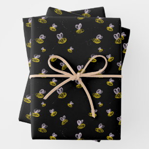 Funky fun bumble bees on black wrapping paper sheet