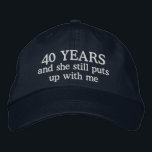Funny 40th Anniversary Husband Hat Gift Cap<br><div class="desc">40th wedding anniversary gift for him says 40 years and she still puts up with me on an embroidered ball cap hat for the man married forty years to the same wife.</div>