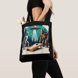 Funny Alien Playing cornhole Bigfoot And UFO Tote Bag