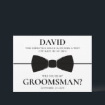 Funny and Elegant Custom Groomsman Proposal Card<br><div class="desc">Make your groomsman proposal both memorable and stylish with this elegant card. Personalised with the recipient’s name, it features a playful message: "This definitely could have been a text (she made me do this). Will you be my Groomsman?" A sleek black bow tie design adds a touch of sophistication, while...</div>