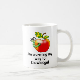 Funny apple and worm education pun art coffee mug