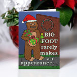 Funny Bigfoot Merry Christmas Pun Sasquatch Holiday Card<br><div class="desc">This funny pun cartoon greeting card shows a picture of Bigfoot on the front. He's holding flowers, carrying wine and a wrapped gift while wearing a red Santa hat and grinning. He's standing at your door. The text reads, "Bigfoot rarely makes an appearance... " Then the inside of the card...</div>