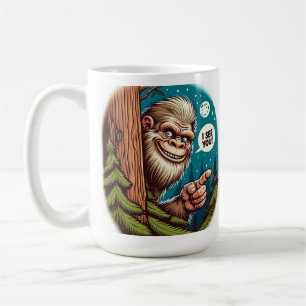 Funny Bigfoot Peeking from Behind Tree Coffee Mug