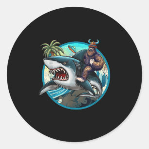 Funny Bigfoot Riding A Shark _ Hilarious Sasquatch Classic Round Sticker