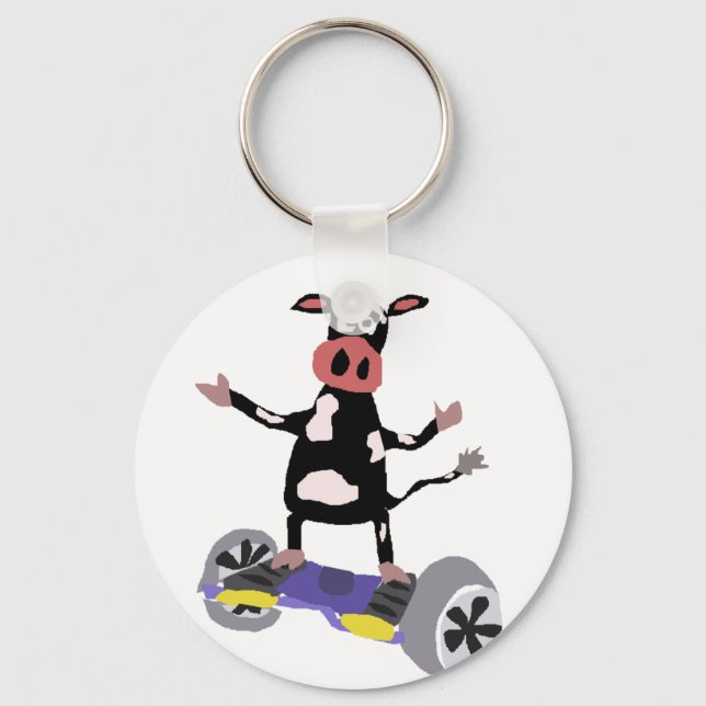Funny Black and White Cow on Hoverboard Key Ring (Front)