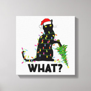 Funny Black Cat Pushing Christmas Tree Over Cat Ch Canvas Print