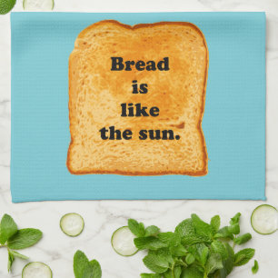 Funny. Bread is like the sun. Tea Towel
