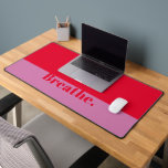 Funny Breathe Modern Minimalist Bold Pink Red Desk Mat<br><div class="desc">Add some fun and personality to your workspace with this funny desk mat! This desk mat features a hilarious motivational quote that will make you smile every time you look at it. Whether you work from home or in an office, this desk mat will brighten up your day and keep...</div>