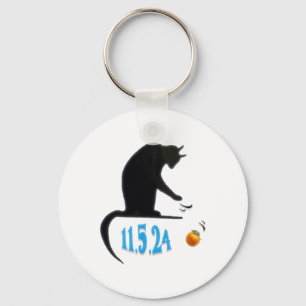 Funny Cat Swatting Orange Off Table On Election Da Key Ring