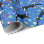 Funny Cats Tangle in Christmas Lights Wrapping Paper<br><div class="desc">Cats can create mischief in so many more ways than we imagine. Christmas lights are always tangled but get a cat or two involved and moving? Let the party begin. This design was developed at the expense of my Muse cat's ego because it did happen. Tangled in the lit Christmas...</div>