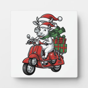 Funny Christmas Cow Riding Scooter Vintage Design_ Plaque