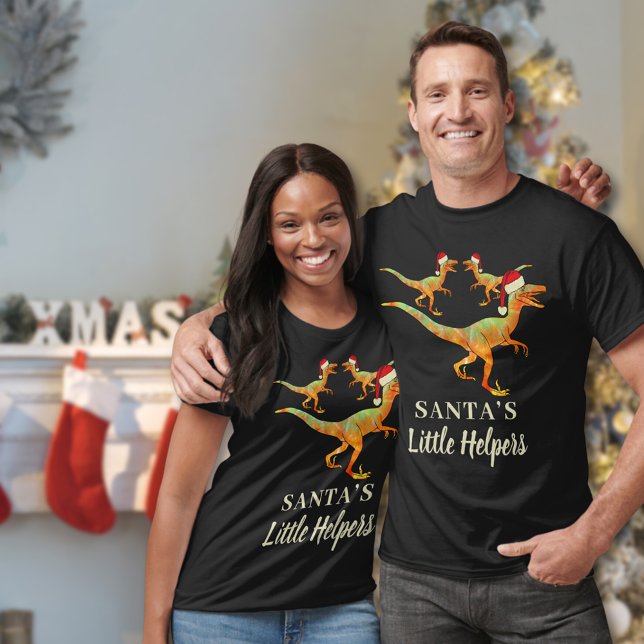 Funny Christmas Dinosaurs Quote T-Shirt (Santas little helpers funny Christmas dinosaur T-Shirt with velociraptor dino wearing Santa hats)