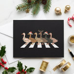 Funny Christmas Ducks Crossing Santa Hat Design Holiday Card<br><div class="desc">This playful holiday design features a row of ducks crossing the street with festive Christmas details on a black background. Some wear Santa hats, one has reindeer antlers, and the string lights add a fun seasonal touch. The crossing layout gives the artwork a clever, humourous feel while keeping the farm...</div>
